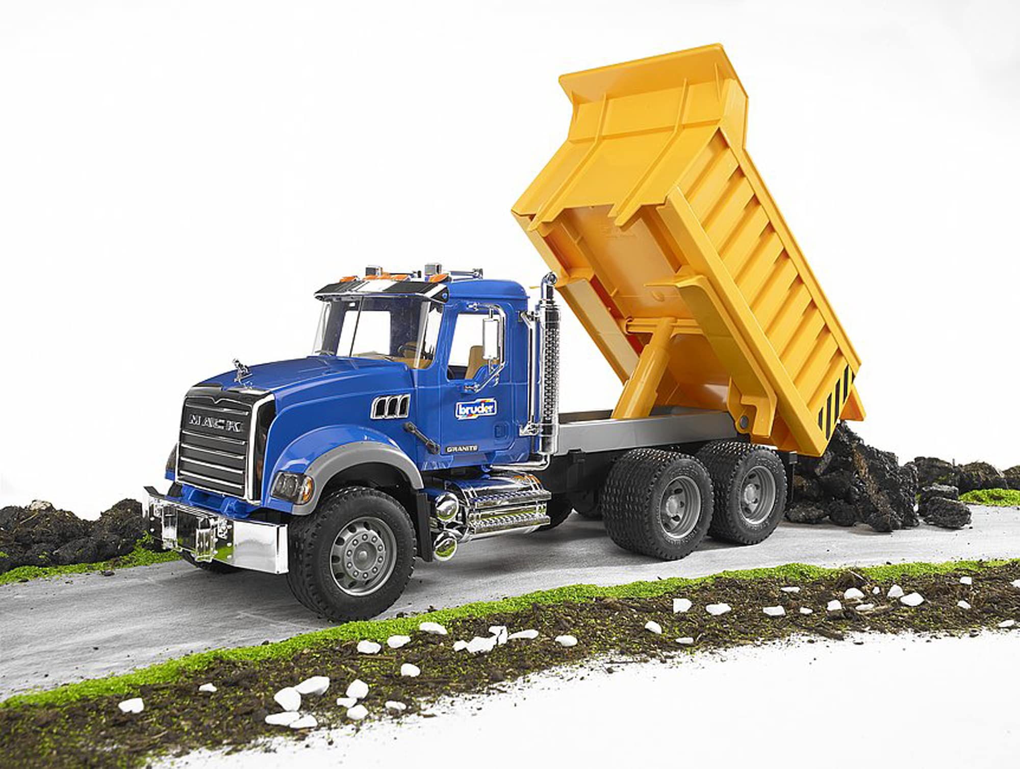 Bruder Mack Granite back gate opens for realistic dumping actions.