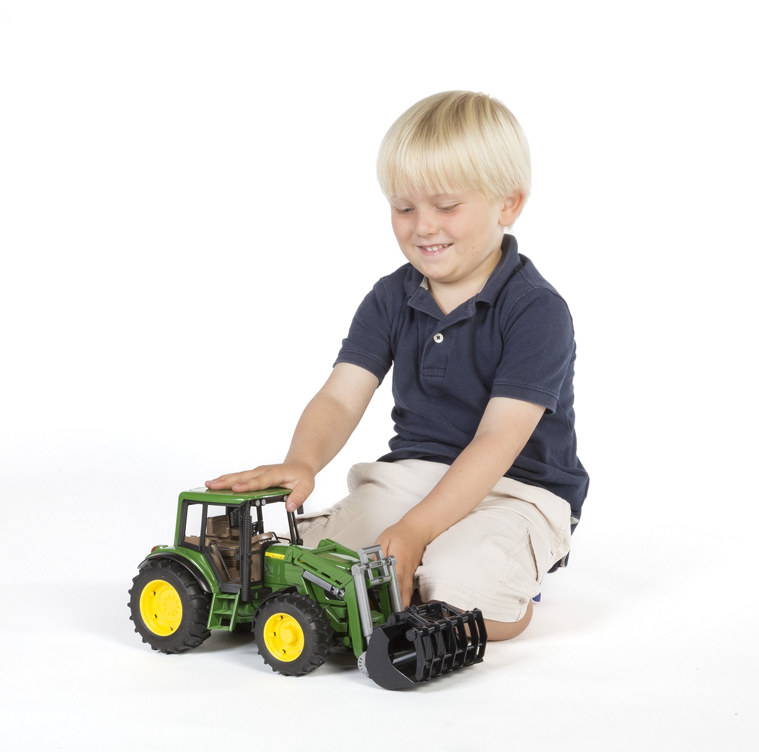 Bruder 6920 Profile-series trailer compatibility supports expanding play with additional implements.