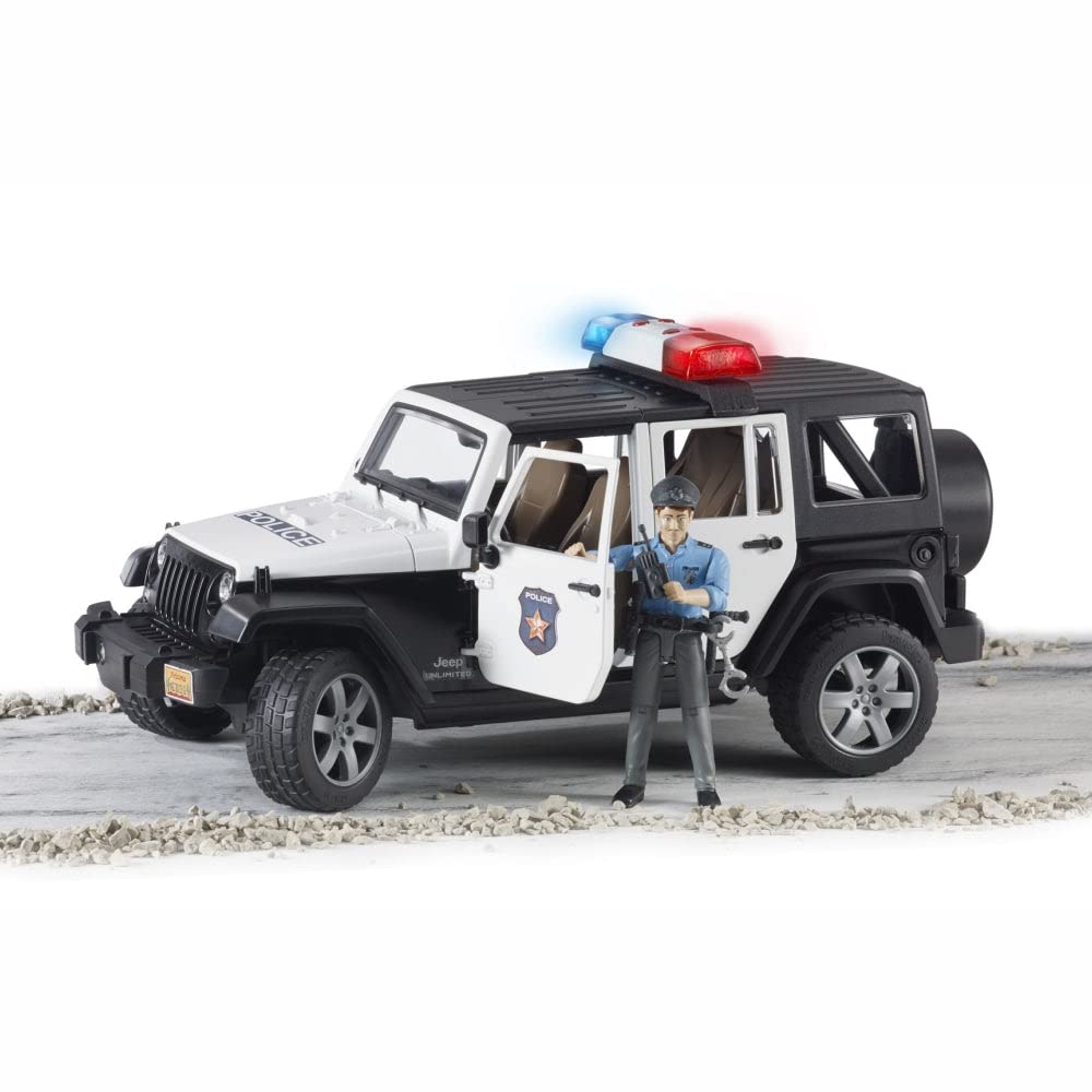 Bruder bworld policeman figure seated in the police car for realistic scenes.