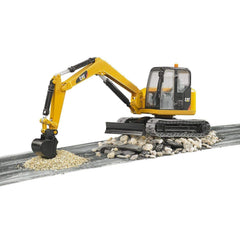 Bruder CAT mini excavator 180-degree bucket arm for versatile digging reach.