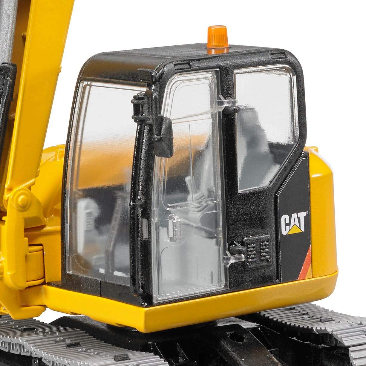 Bruder CAT mini excavator tracked chassis offers stability on uneven surfaces.