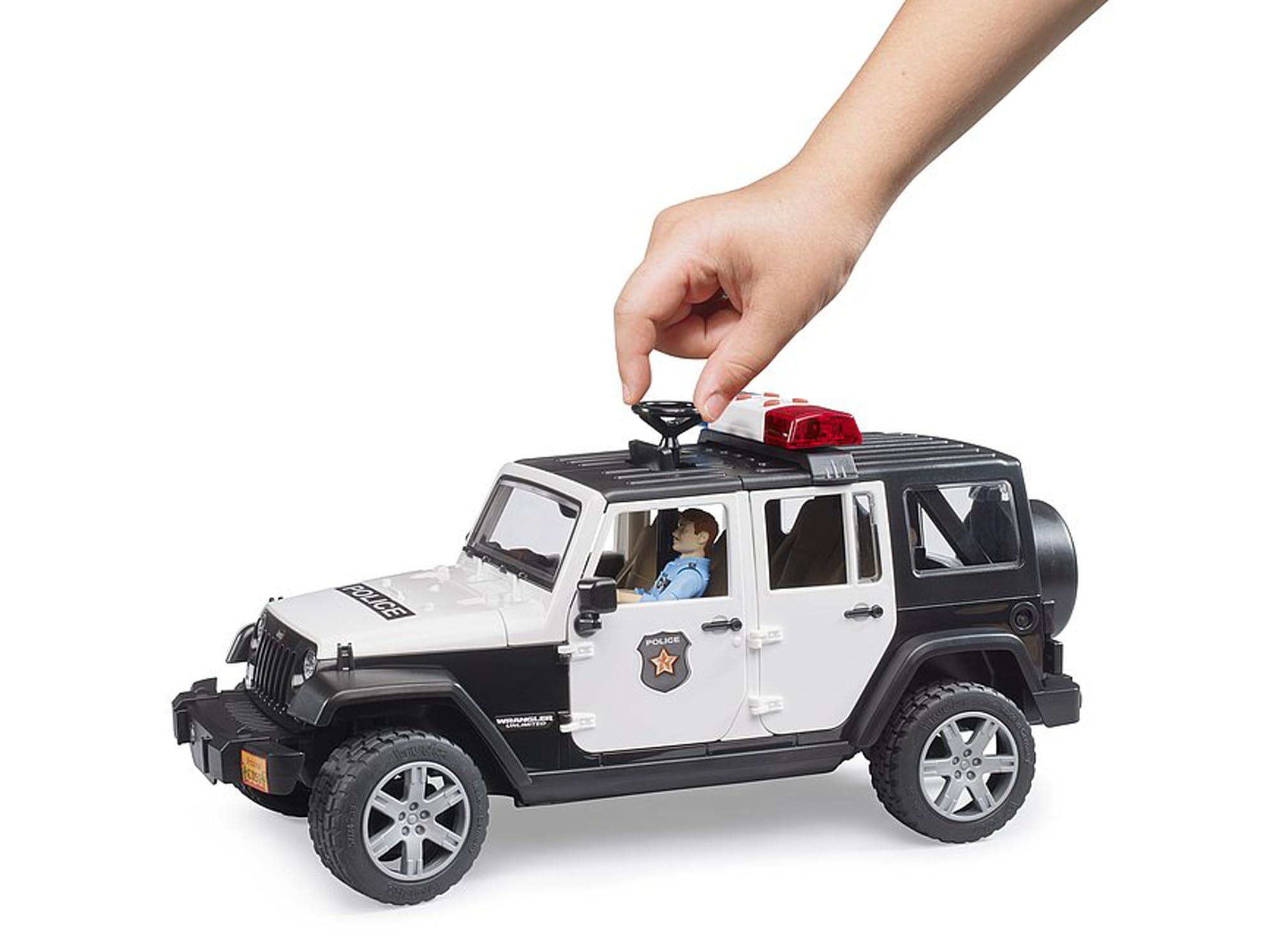 Bruder drag link enables roof-hatch steering for realism.