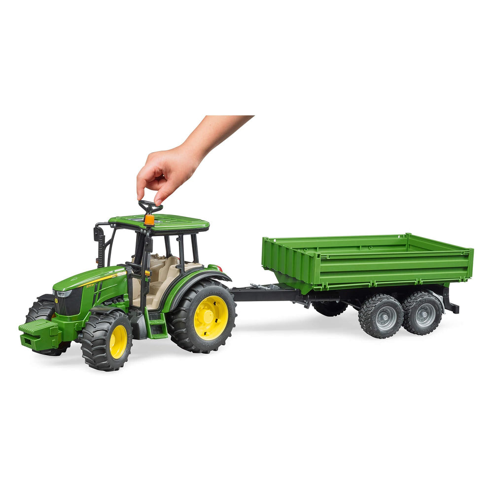 BRUDER John Deere 5115M with trailer side view highlighting durable construction for indoor and outdoor play.