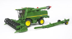 Bruder John Deere T670i grain tank drain enables spill-free pretend harvest.