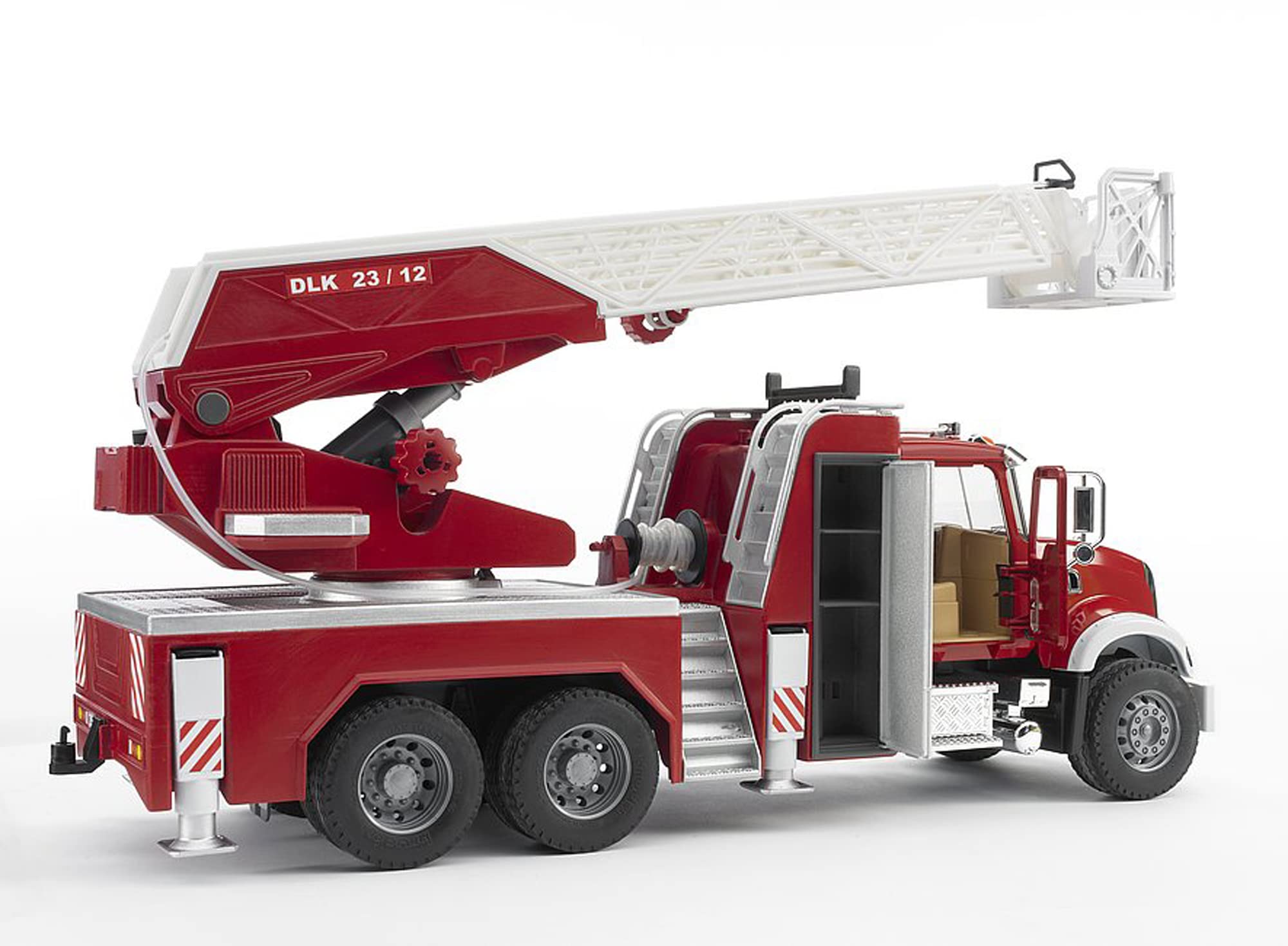 Bruder Mack Granite fire engine turntable ladder extended for elevated scenes.