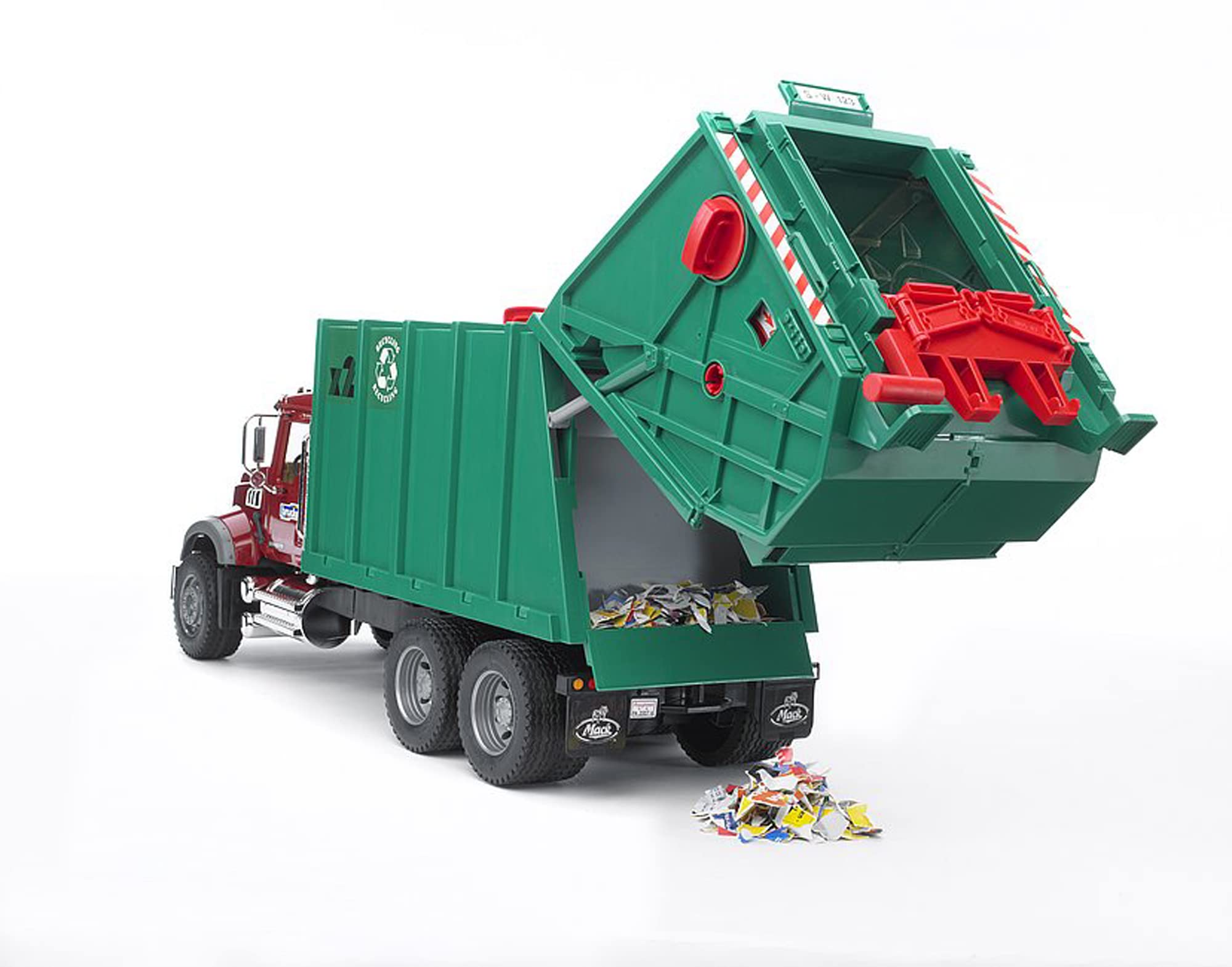 Bruder MACK Granite Garbage Truck working press in action for pretend waste transfer.