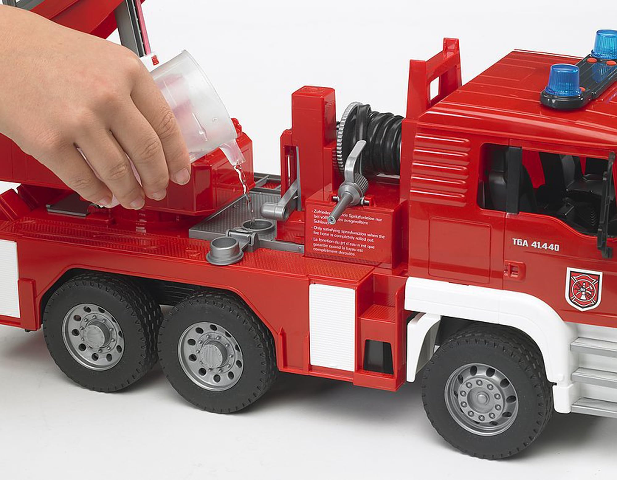 Bruder MAN Fire Engine water pump and tank add realistic water play