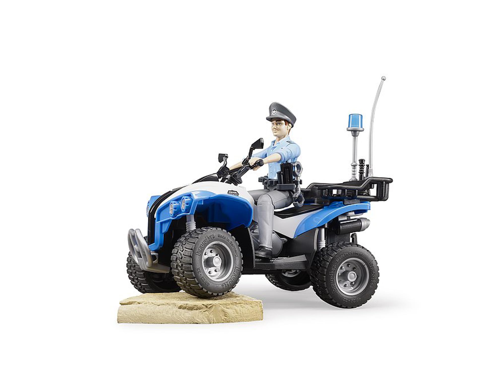 Bruder quad suspension image demonstrates agile handling on uneven outdoor terrain for imaginative adventures.