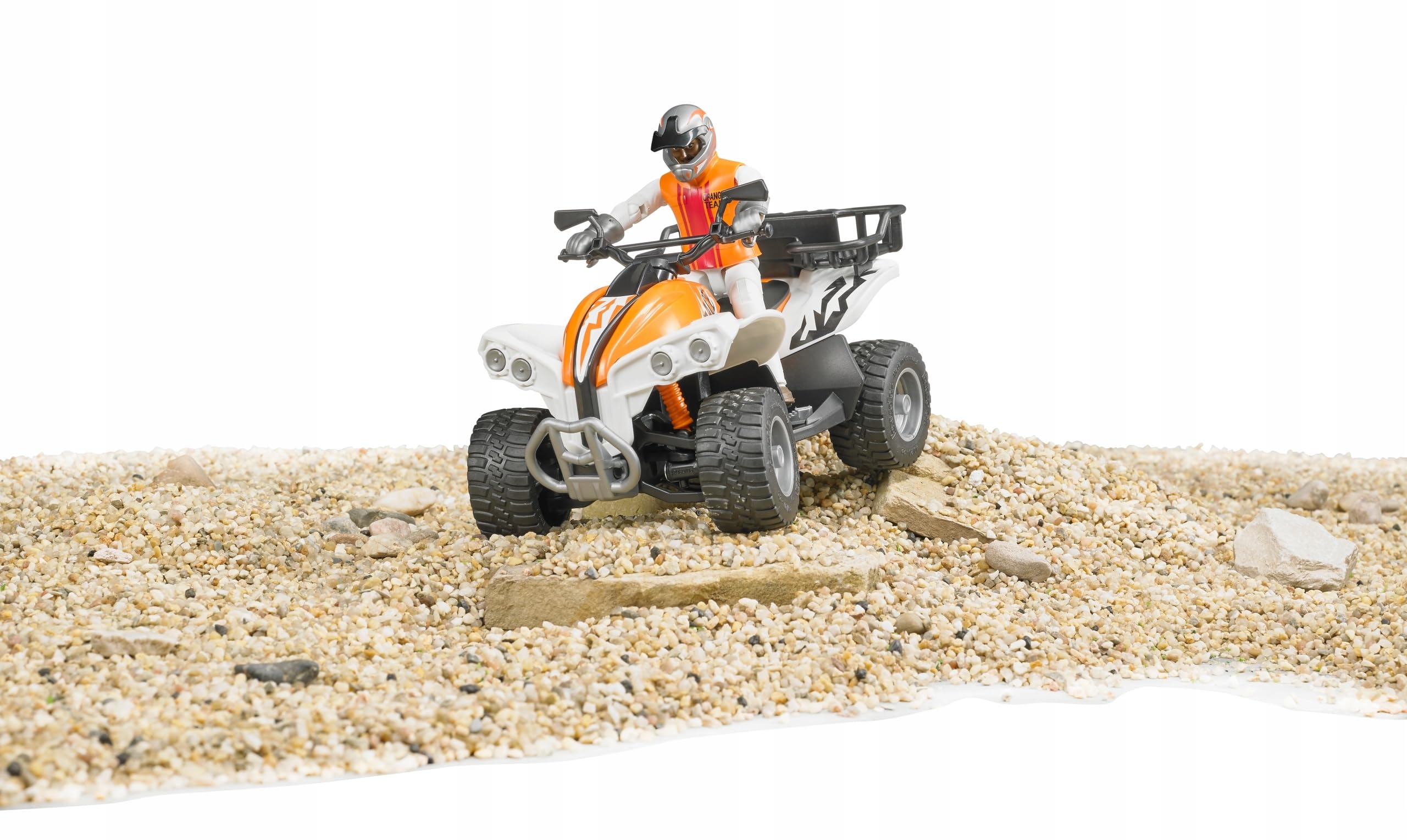 Bruder Quad with Driver bworld figure in action, scale interaction enhances storytelling