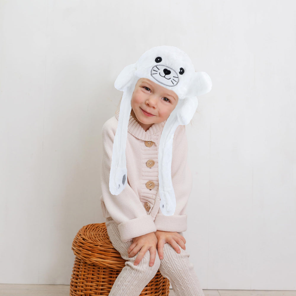 Capture joyful memories with Bubblepompom seal hat during celebrations.