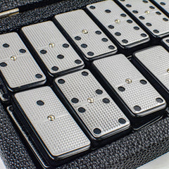 Domino tiles tucked in travel case ready for on-the-go play