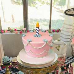 Bucherry Wonderland blue flowers decorating cakes and dessert tables