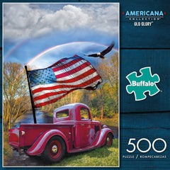 Buffalo Games Celebrate Life Gallery Old Glory puzzle pieces spread across a table for focused solo puzzling.