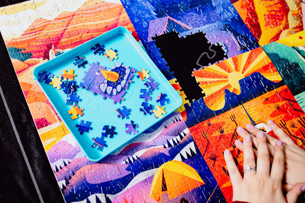 Buffalo Games puzzle mat includes size guides for common counts.