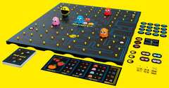 Pac-Man board game setup showing maze tiles and colorful components by Buffalo Games.
