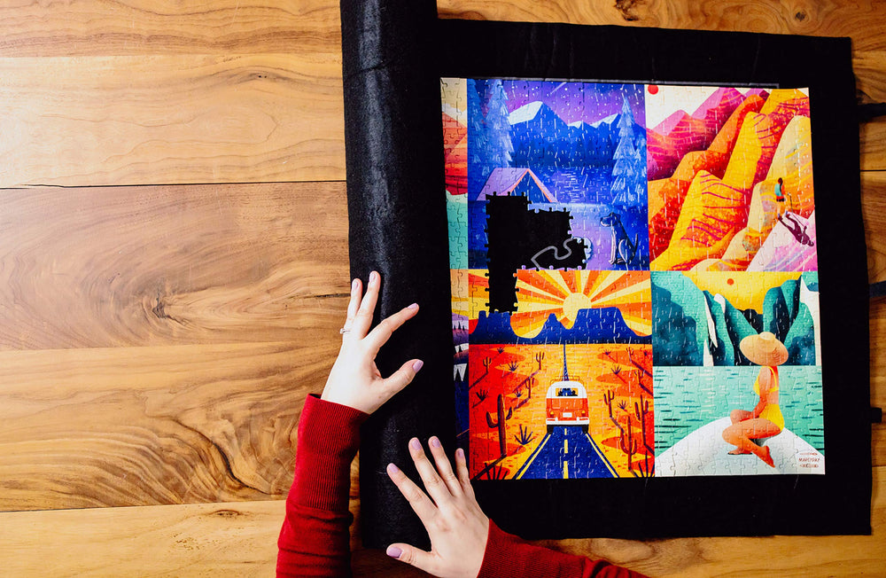 Buffalo Games Velcro straps keep rolled puzzles secure.