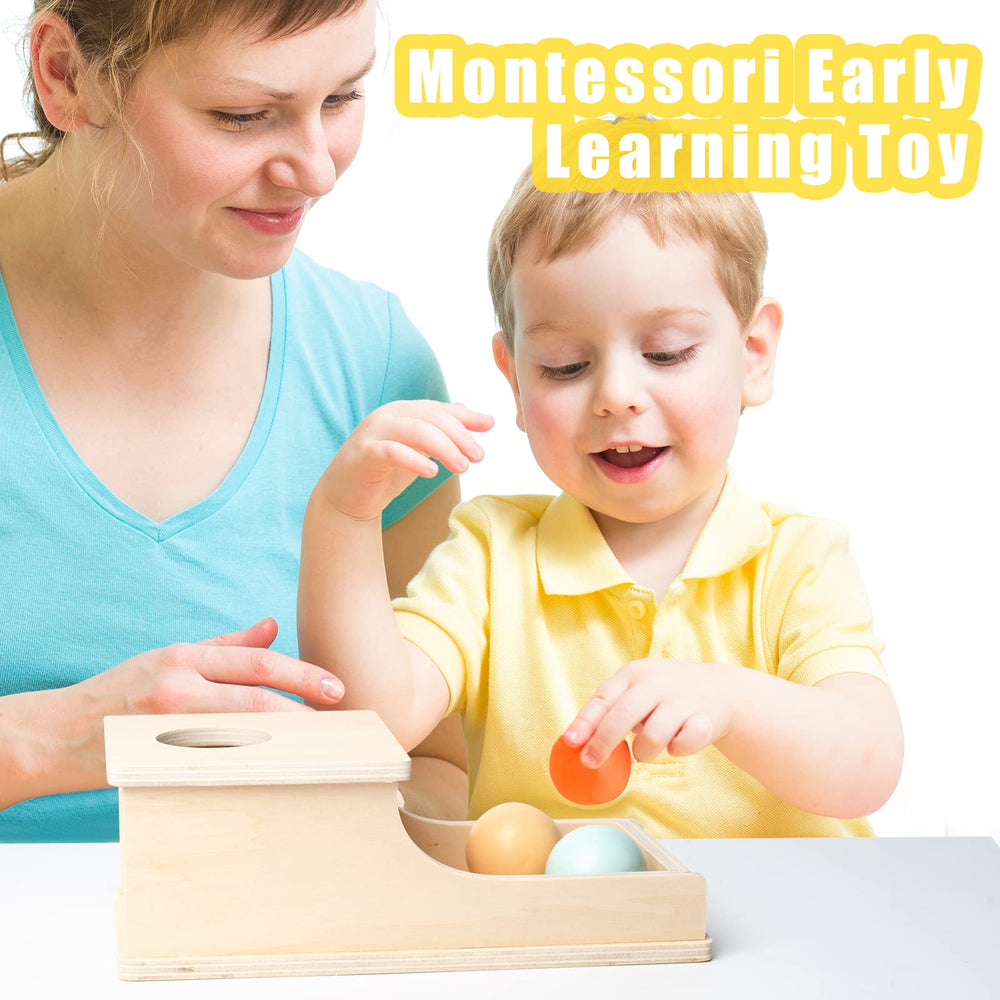 Busy Edition sensory development toy stimulates visual tracking and spatial thinking during drop play.