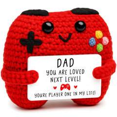 Busy Gaming Life crochet game controller on a desk adds daily inspiration.