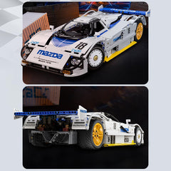 CaDA C63007W Mazda 787B drivetrain motion shows mechanical dynamics for photography.