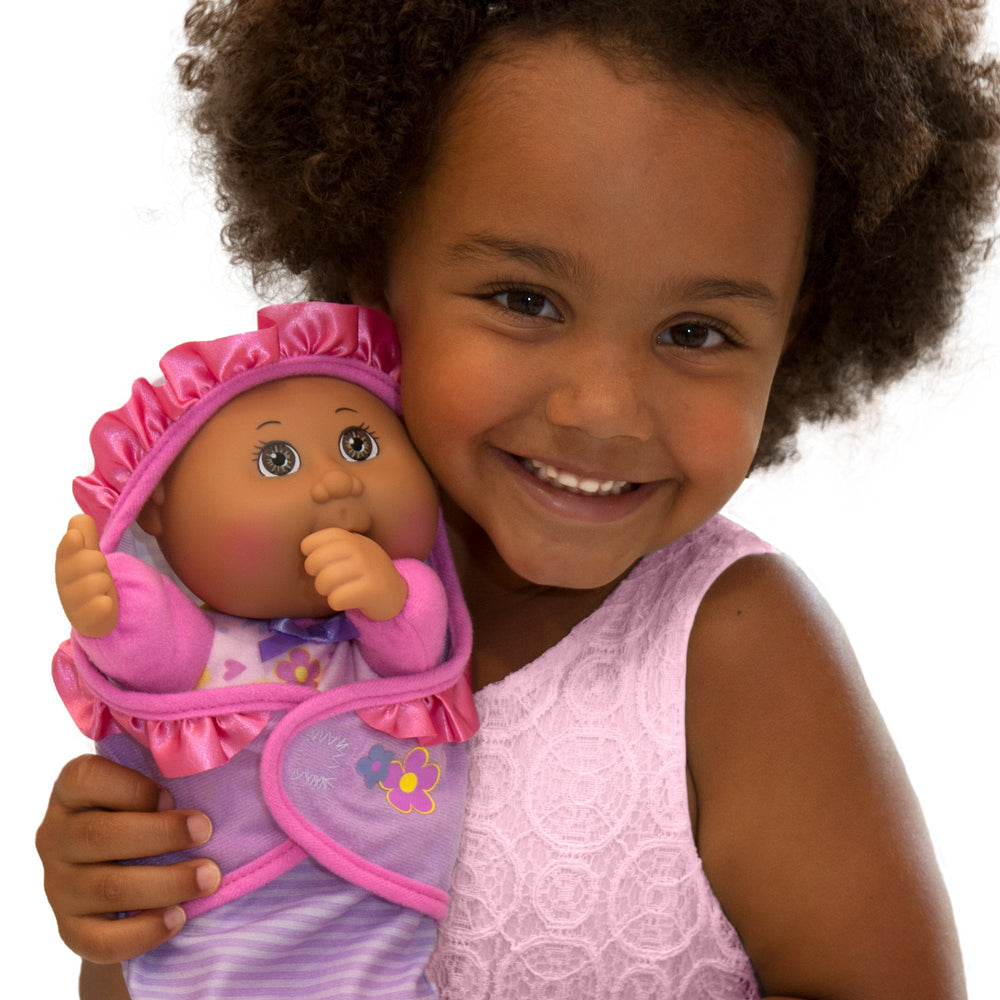 Cabbage Patch Kids adoption birth announcement tag adds a personal story to playtime.