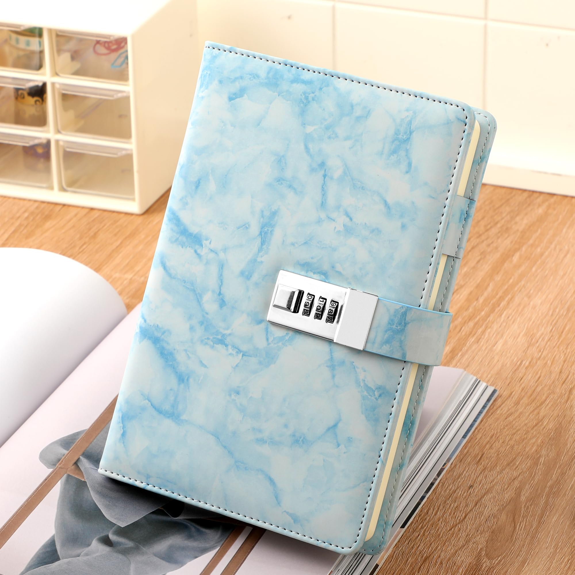 CAGIE Marble Diary with Lock blue compact size fits bags for on-the-go journaling.