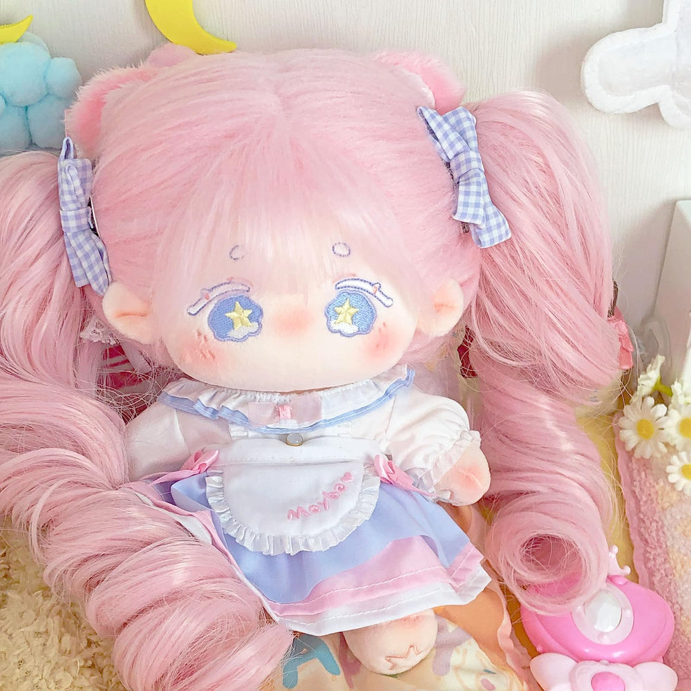 Calembou plush doll with two braids and purple bow, playful styling options.