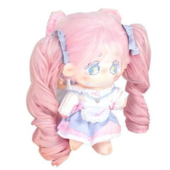 Calembou plush doll with included clothes options to expand play scenarios.