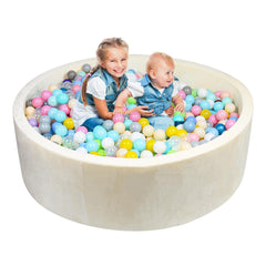 CALEPTONG foam ball pit round shape in coral fleece for safe toddler play indoors.