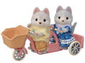 Calico Critters Husky tandem bike with rotating wheels for imaginative rides.