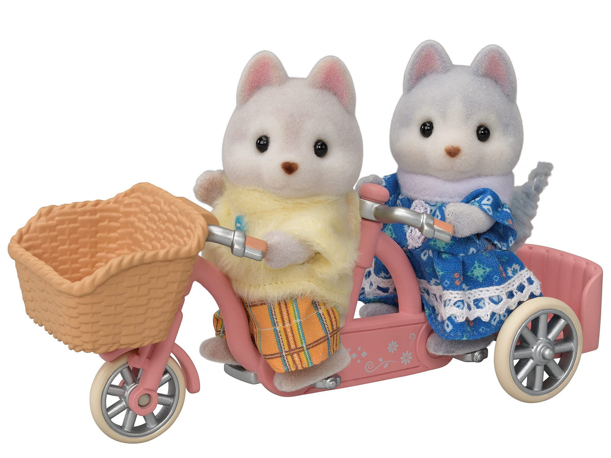 Calico Critters Husky tandem bike with rotating wheels for imaginative rides.