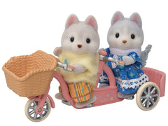 Calico Critters Husky tandem bike with rotating wheels for imaginative rides.