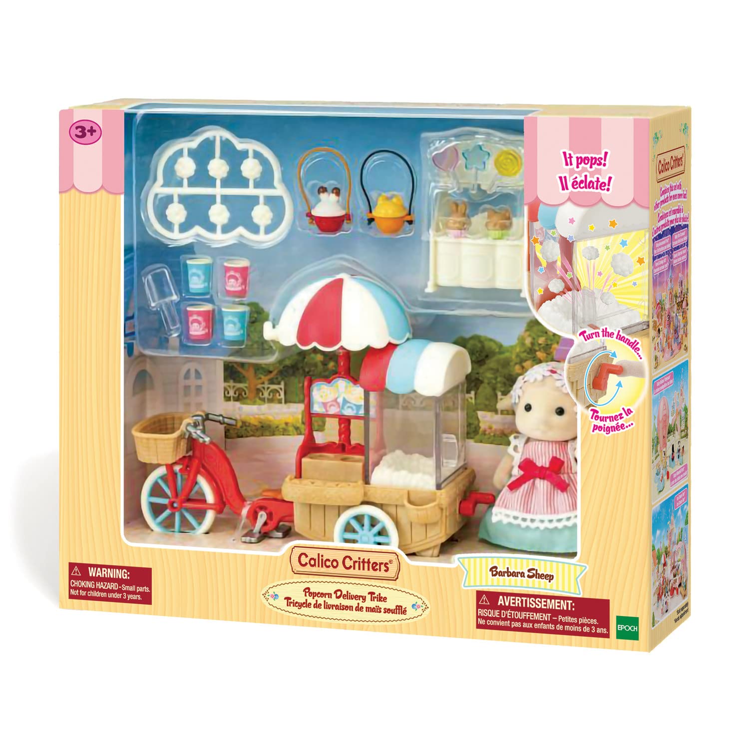 Calico Critters Popcorn Trike with rotating wheels enhances interactive play.