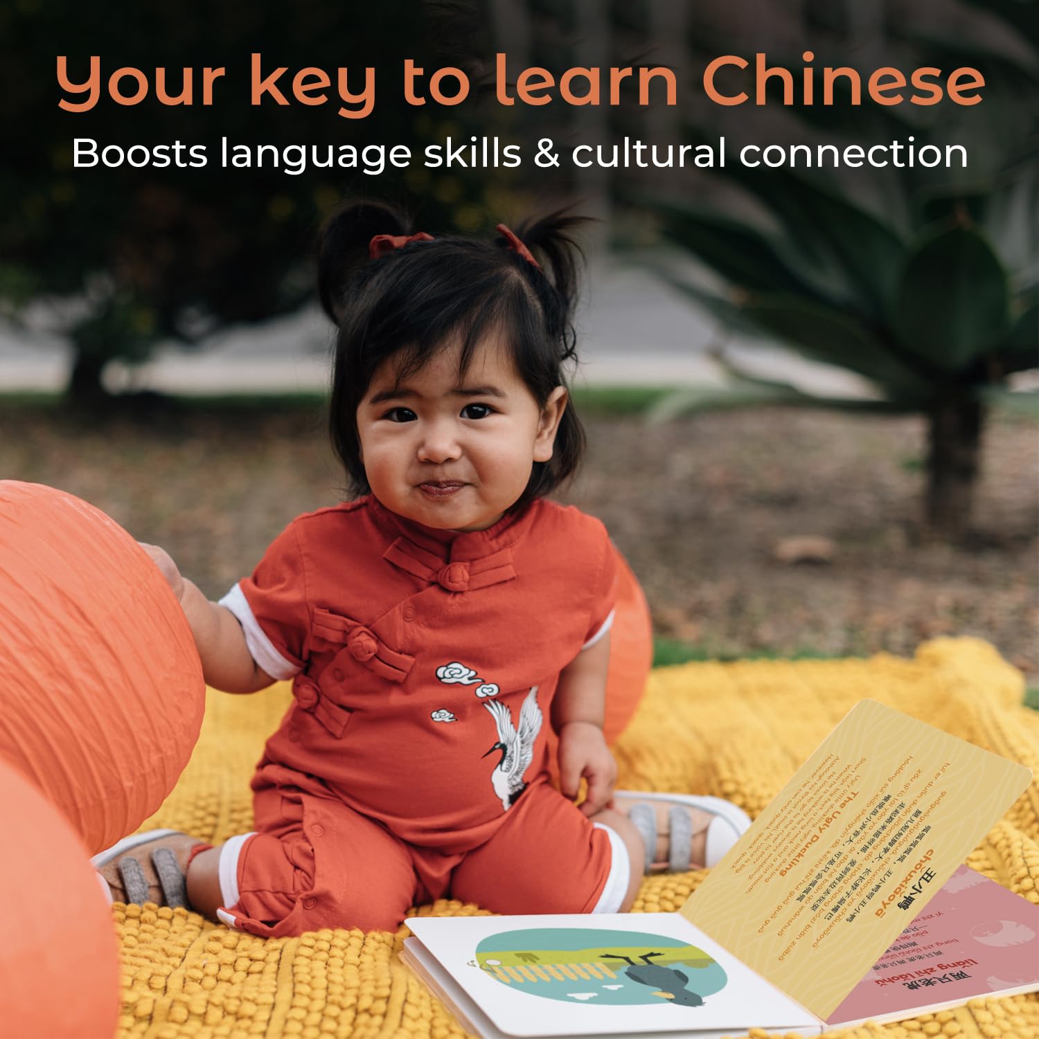 Child interacting with Cali's Books, encouraging early musical exploration.