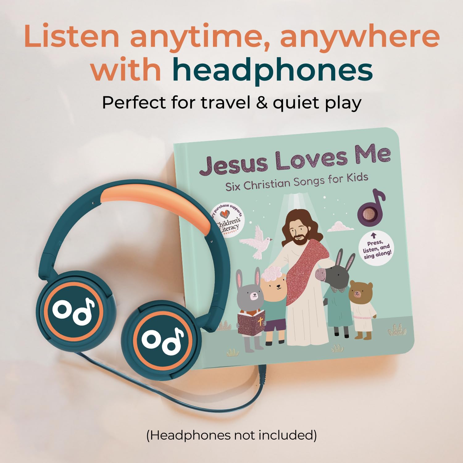 A toddler plays and sings along with the interactive pages.