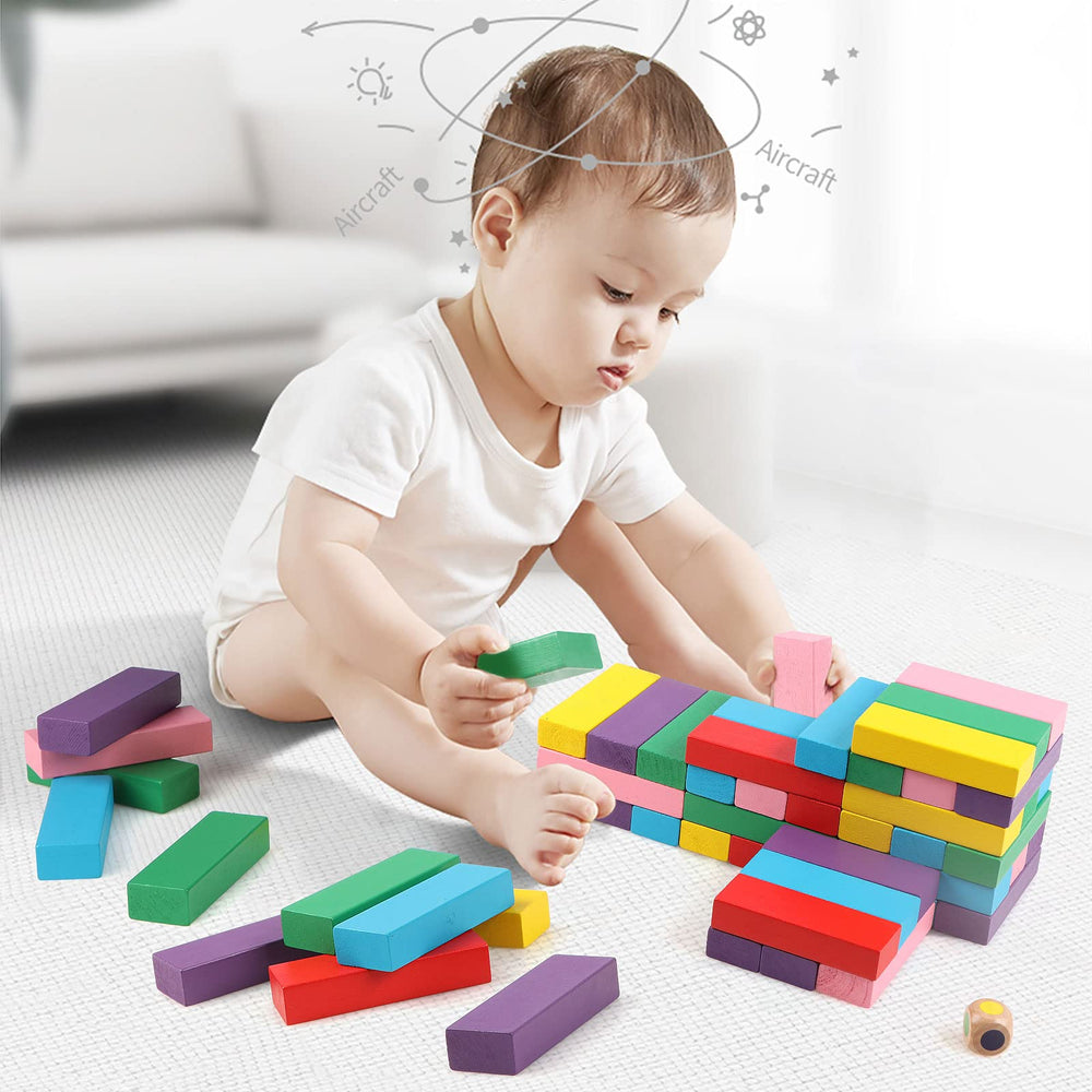 Canuan family play session with wooden blocks supporting cooperative problem solving.