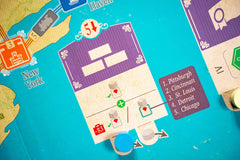 Capstone Games Age of Rail components pack with cards and markers.