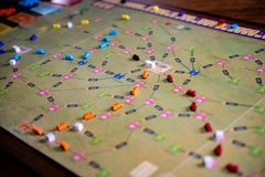 Capstone Games Age of Rail South Africa player pieces ready for strategic decisions.