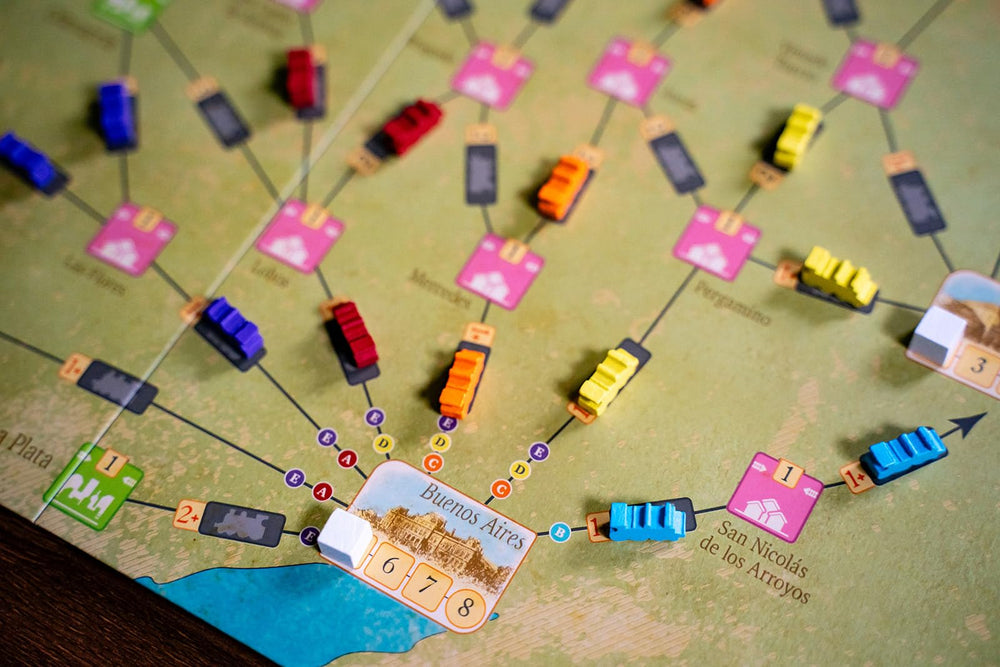 Capstone Games Age of Rail track-building layout on the board.