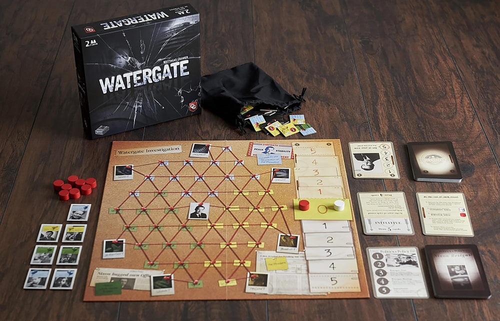 Capstone Games Watergate box and components on display, highlighting tactile setup for a fast two-player match.