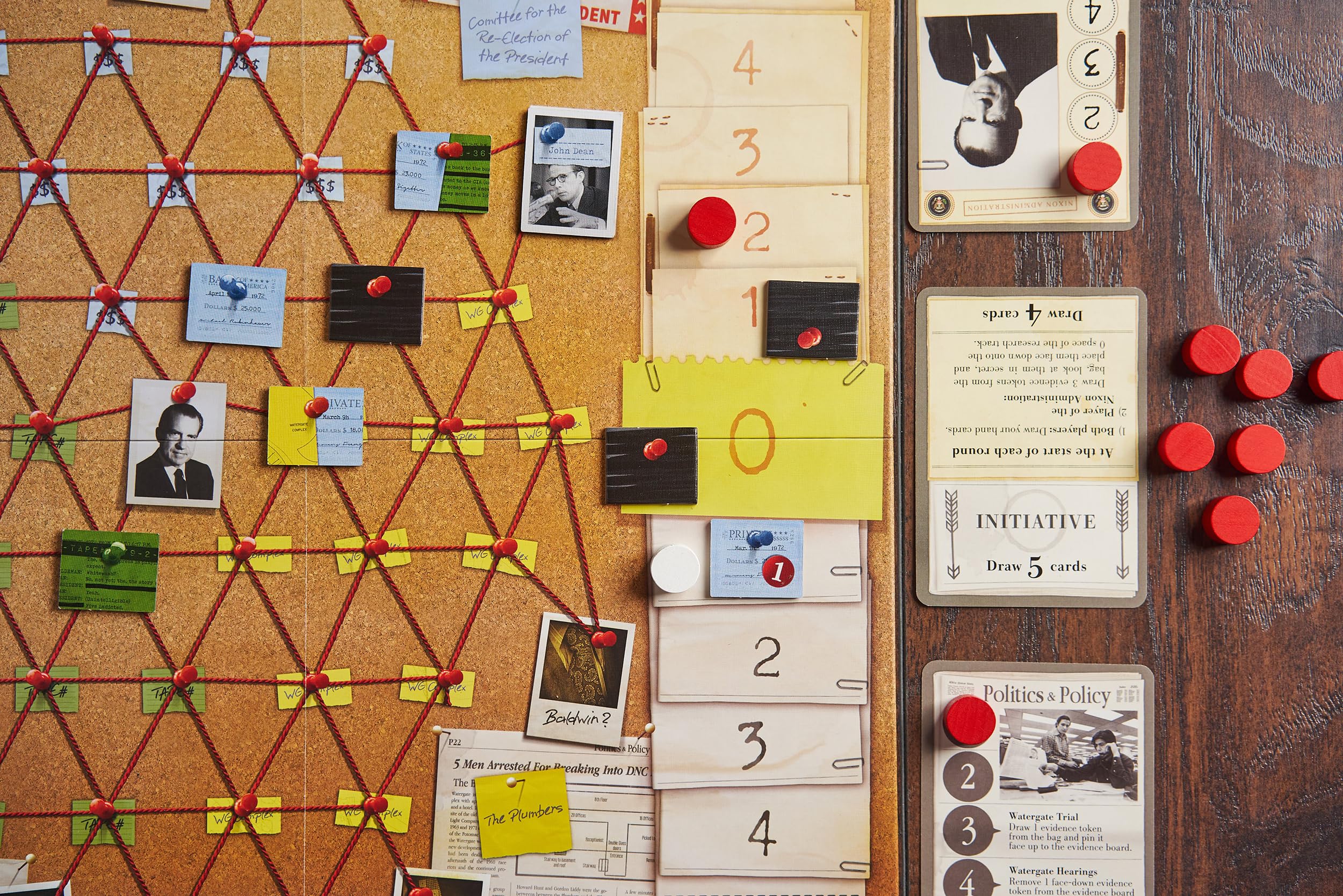 Capstone Games Watergate playmat and cards spread, evoking historical atmosphere and strategic decision making.
