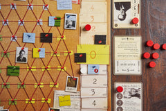 Capstone Games Watergate playmat and cards spread, evoking historical atmosphere and strategic decision making.