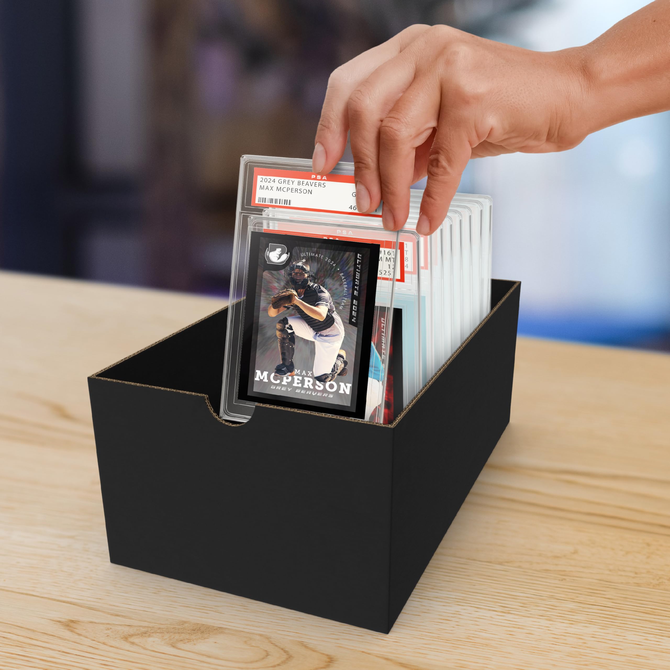 Cardboard Gold display-ready sleeves showcase PSA slabs while keeping cards pristine