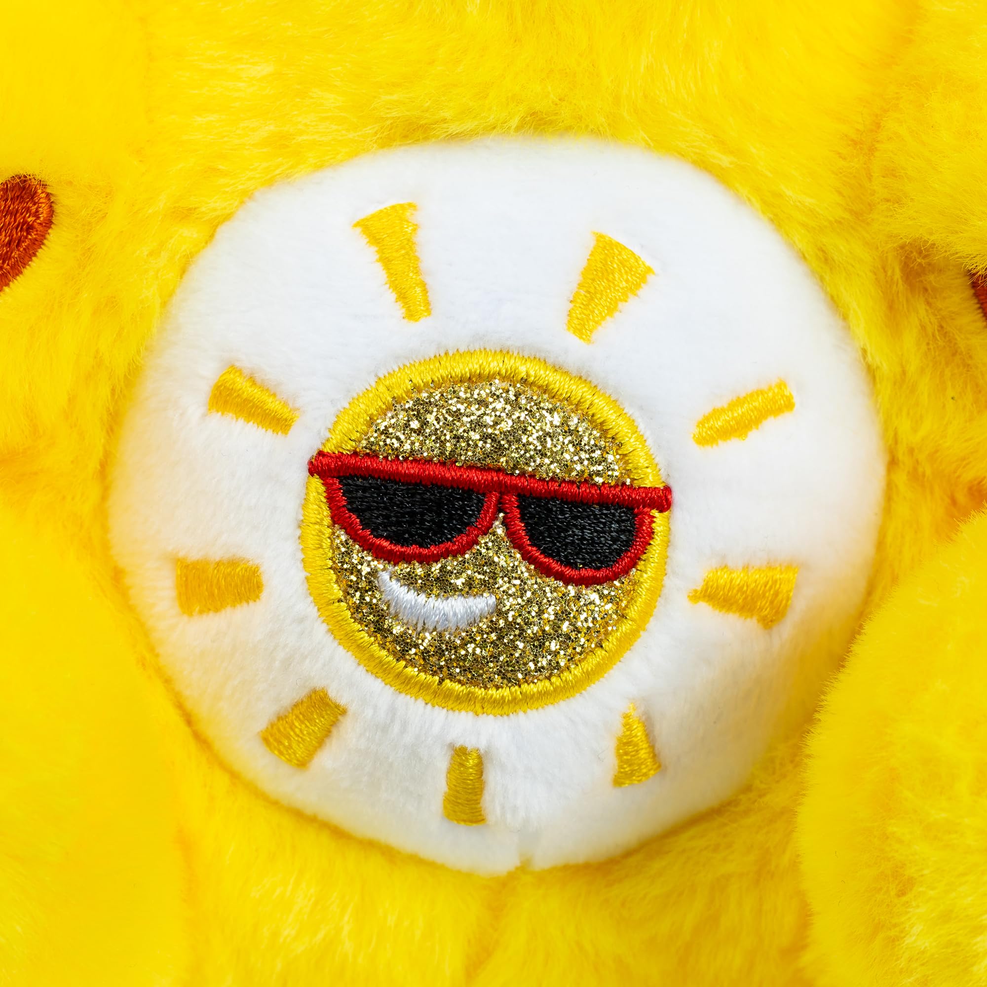 Hello Kitty Funshine Bear plush with sunny badge for bright play.