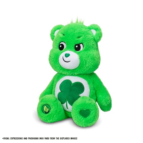 Close-up of Care Bears Good Luck Bear belly badge with four-leaf clover.