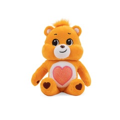 Care Bears Tenderheart Bear 9-inch plush with glitter eyes and glitter belly badge for sparkly cuddles.