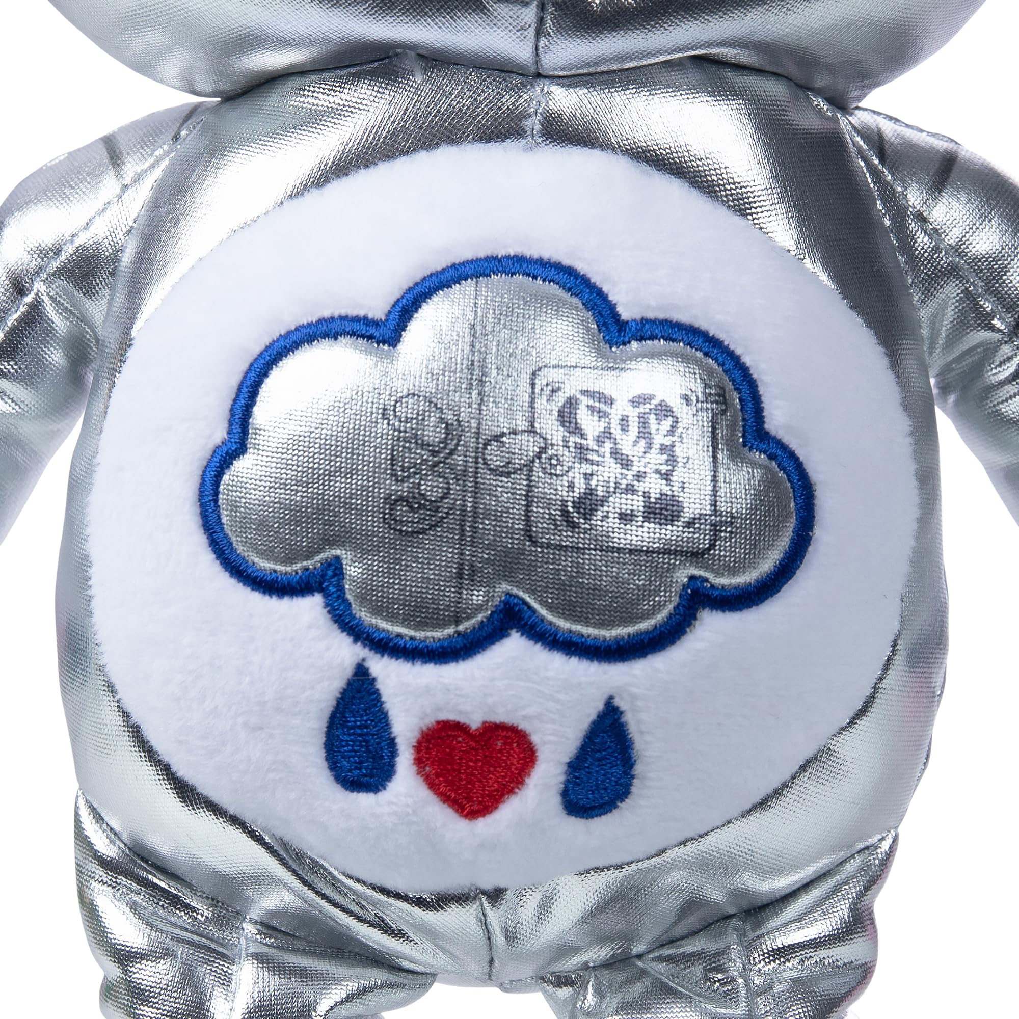 Care Bears Wicked Tin Man plush features shiny silver finish for movie-inspired charm.