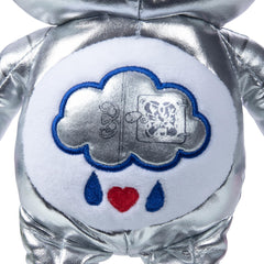 Care Bears Wicked Tin Man plush features shiny silver finish for movie-inspired charm.