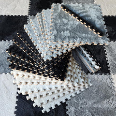 CARPETBOX 16-piece puzzle mat close-up showing interlocking tiles for easy safe play area.