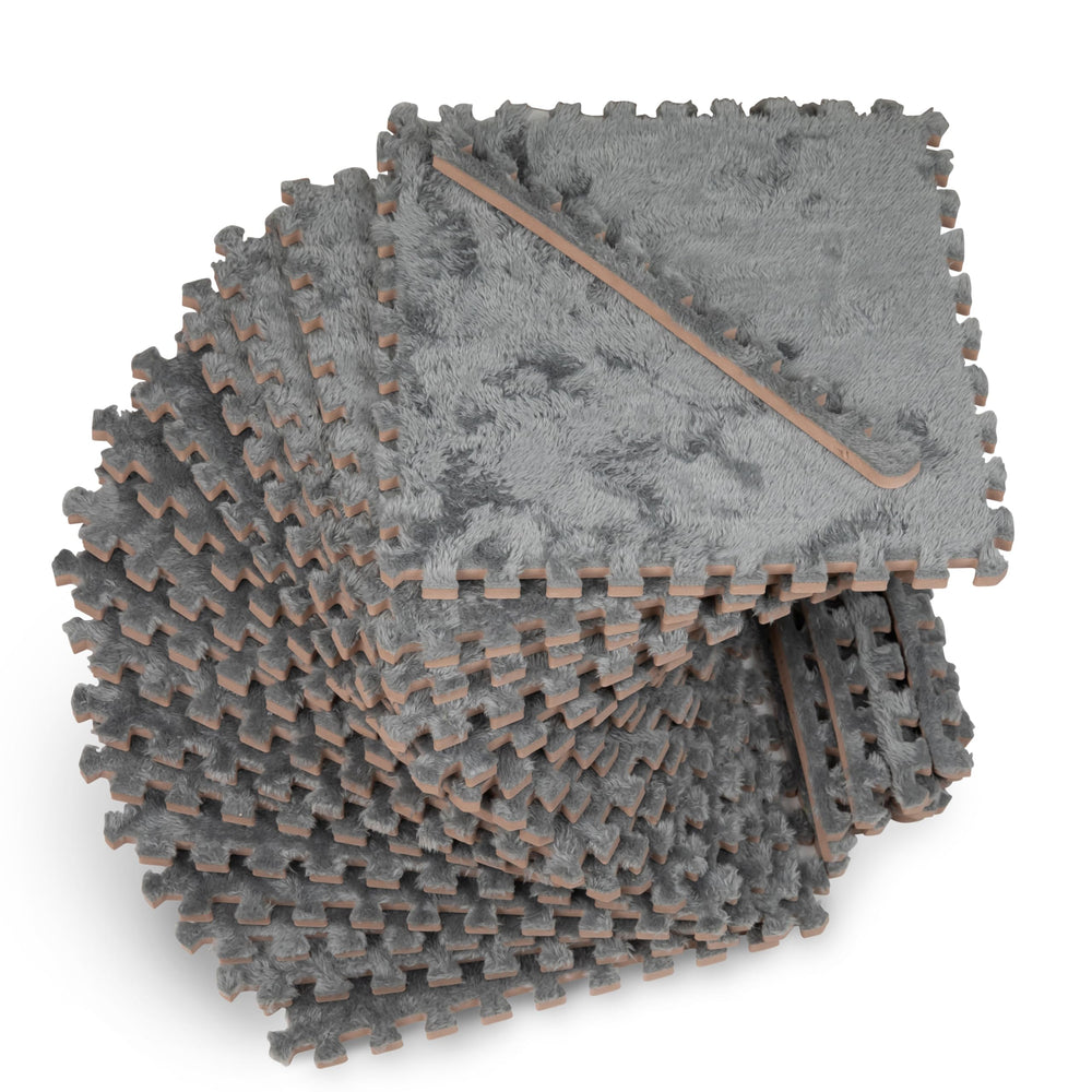 CARPETBOX 16-piece puzzle mat with interlocking edges for a safer play space.