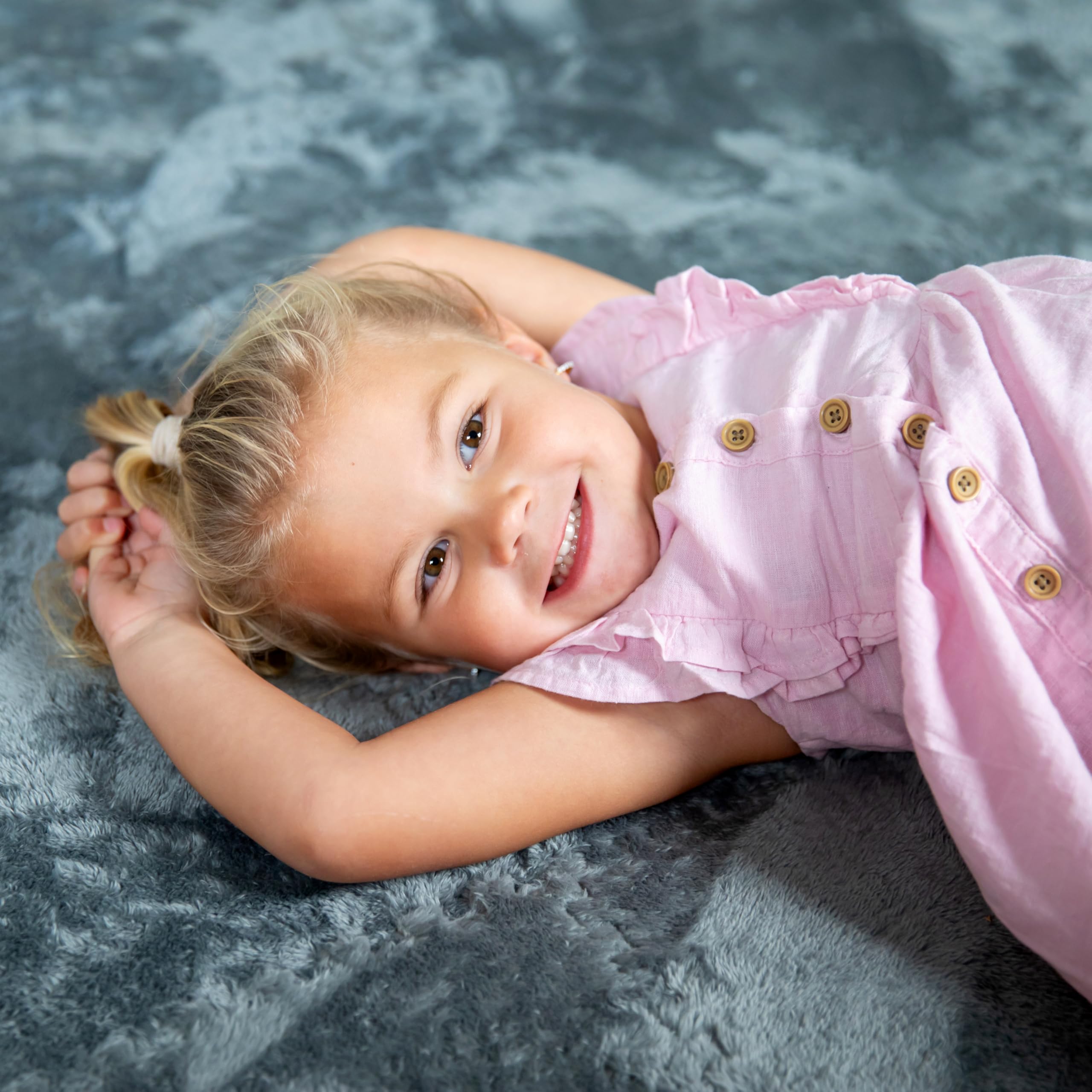 CARPETBOX interlocking foam tiles form a flat, secure surface.